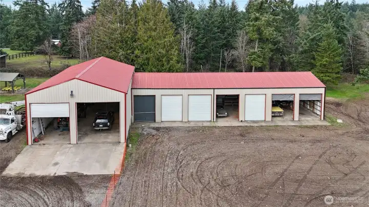 Nine Bay Corrugated Steel Garage With Electricity And Lighting On Concrete Pad