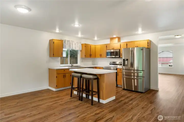 Nicely updated kitchen with lots of counter top space with recessed lighting