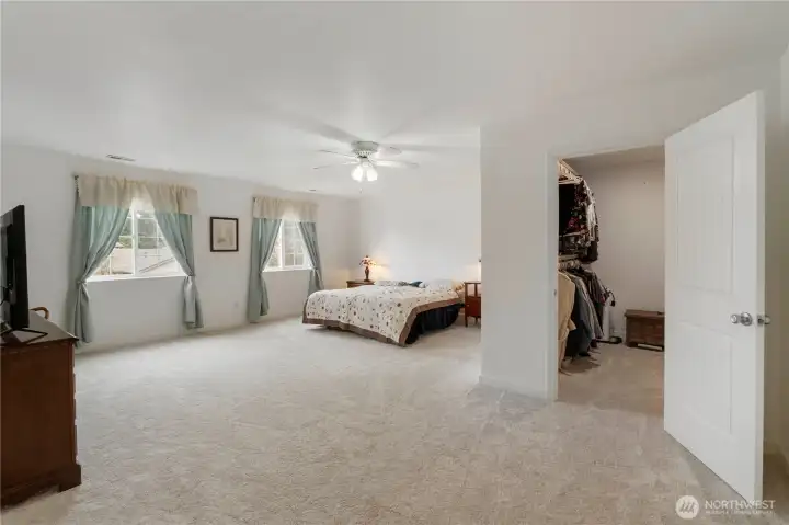 Second oversized bedroom or bonus room with large walk in closet with lots of natural light and new soft carpets