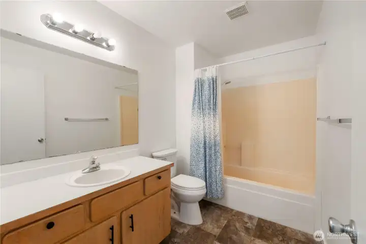 Second full bedroom on 2nd floor with new paint and lighting also