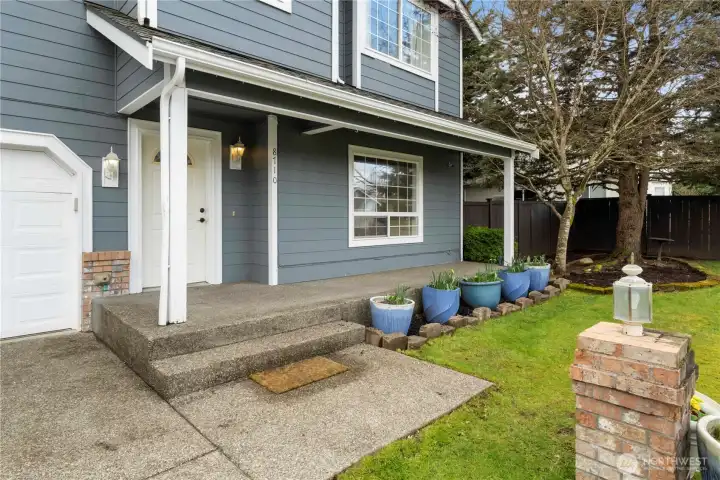 Entry walk way to home with second covered area for morning sunshine views.
