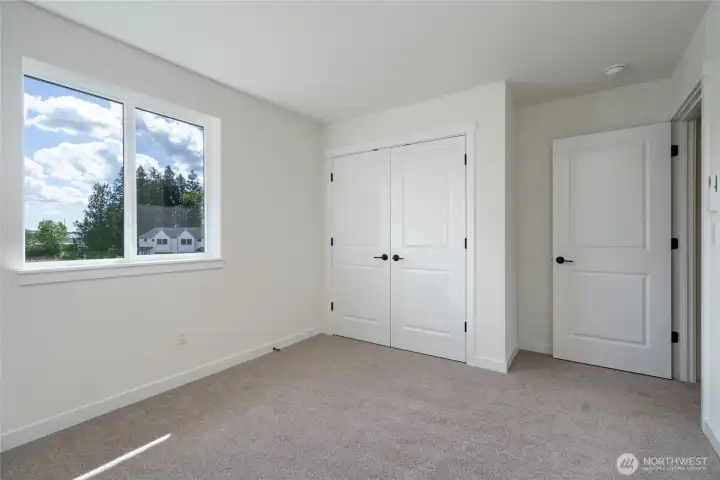 Bedroom 2. Picture of a different duplex.