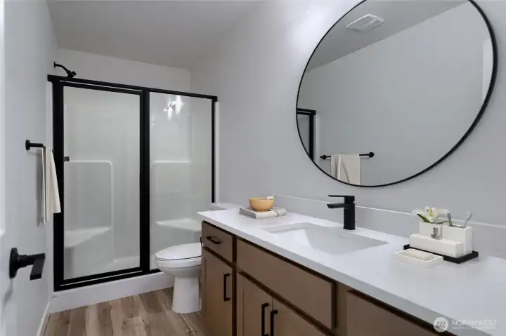 Primary bath. Picture of a different duplex.