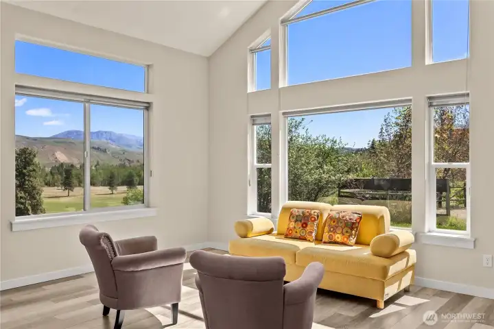 Beautiful large windows bring in the light and views.