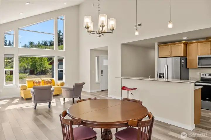 Bright natural light, clean lines and large island allows the chef to host dinner guests.