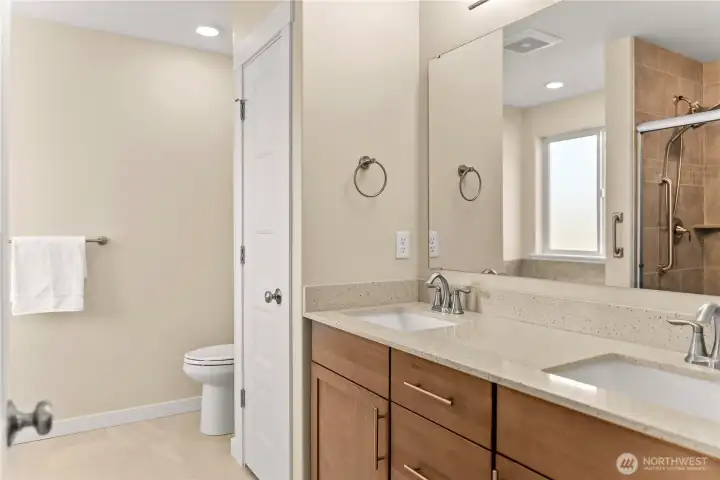 Double vanity with countertops and easy close drawers