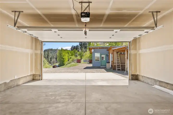 2 car garage keeps your vehicles out of the elements and ready to go.