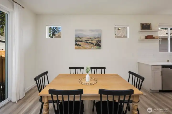 Situated adjacent to the kitchen and living area, the dining space offers room for everyday meals, holiday gatherings, and casual entertaining.