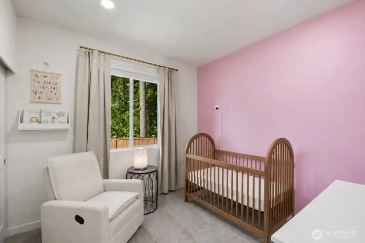 Large windows bring in natural light while maintaining a comfortable and inviting atmosphere.