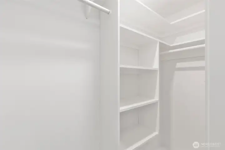 Walk-in primary closet Walk-in primary closet