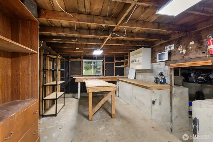 Workshop in basement area accessed from exterior. Workshop in basement area accessed from exterior.
