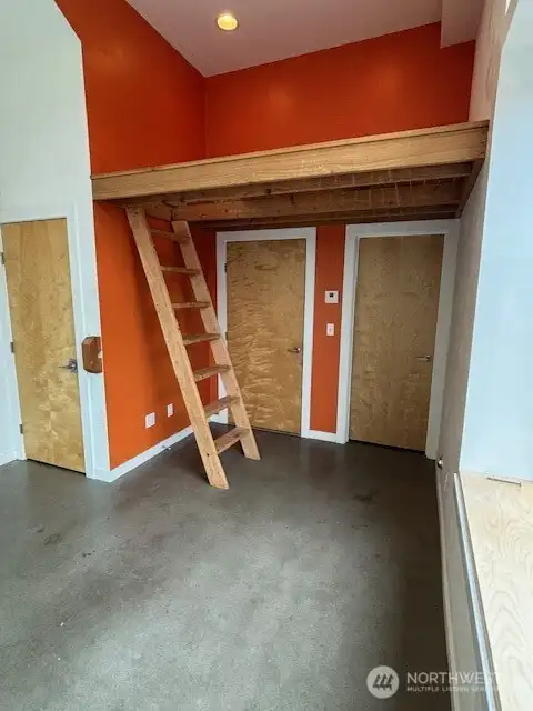 ground floor commercial space showing loft storage
