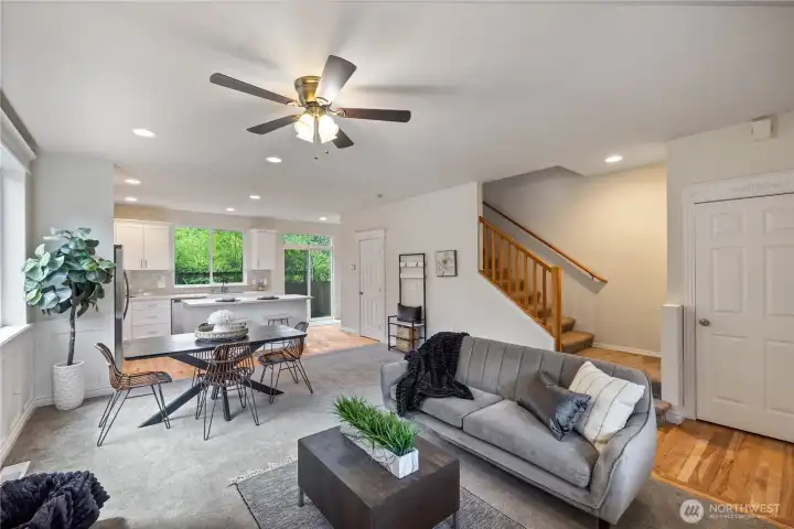 Spacious living room with hardwood floors and enough room to configure multiple seating areas.