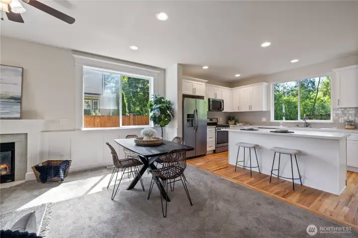 Dining area with ceiling fan and easy access to kitchen