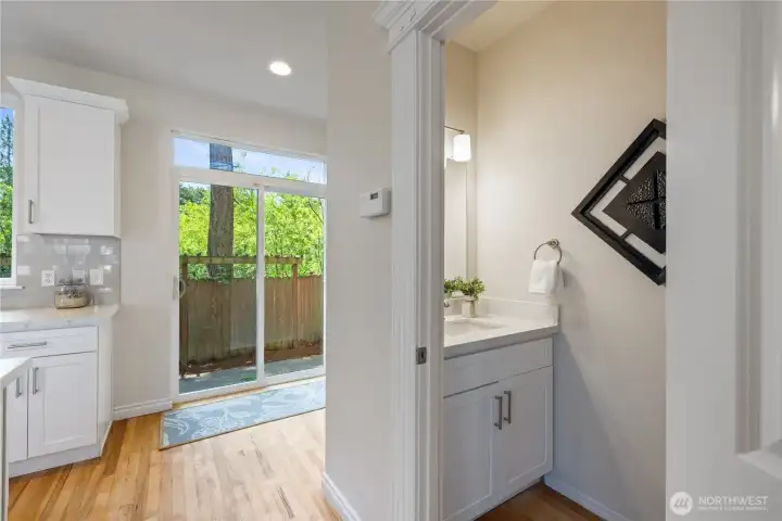 Half bath off dining area, convenient for guests