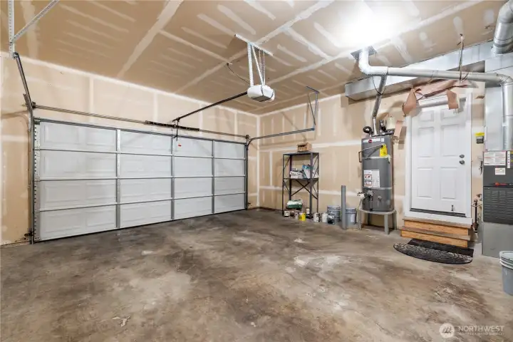 Second garage angle showing the water heater location and how clean and functional the space is