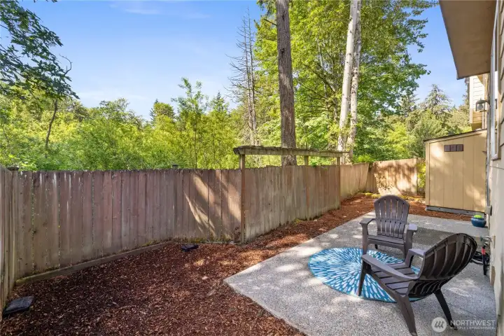 Backyard backs up to a peaceful greenbelt that keeps it feeling private