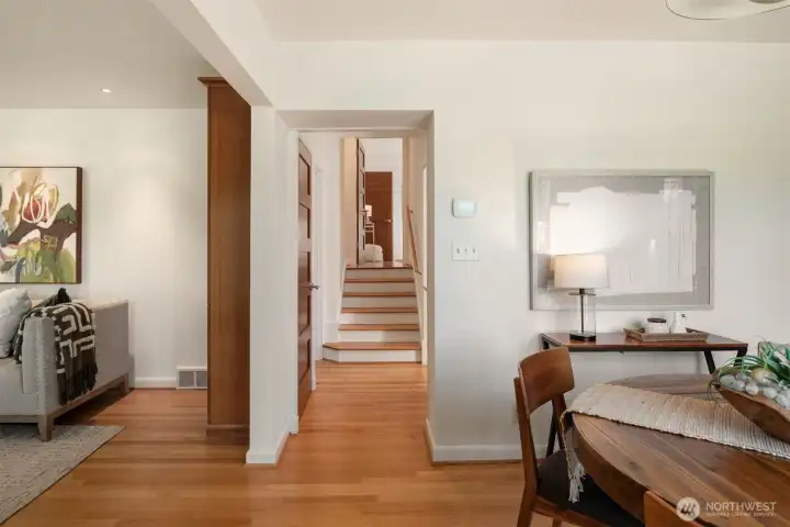 Looking from the main floor to the short stairway up to the bedrooms and bathroom. Looking from the main floor to the short stairway up to the bedrooms and bathroom.