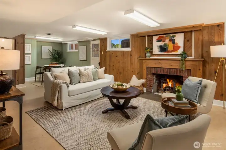 Down in the lower level is the charming family room with a wood burning fireplace, marmoleum floors and charming, wood paneling. Down in the lower level is the charming family room with a wood burning fireplace, marmoleum floors and charming, wood paneling.