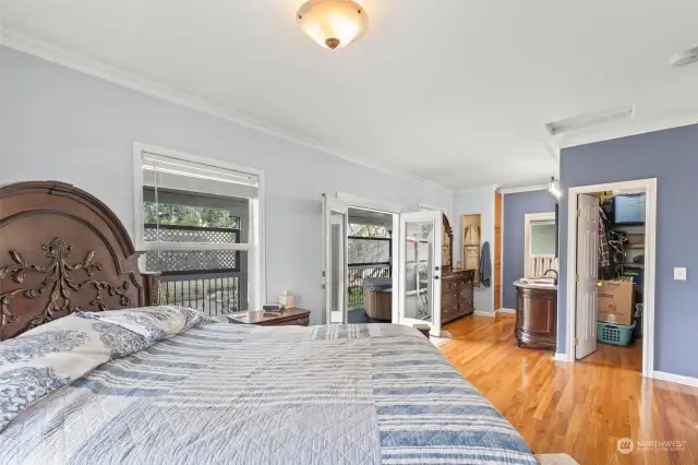 Primary bedroom on the main floor has a walk-in closet and newly remodeled 3/4 bath.