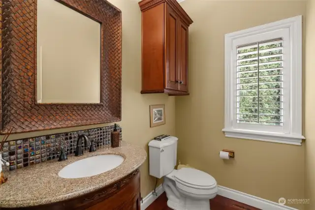 On the main, there is this half bath AND a bath off the guest room.