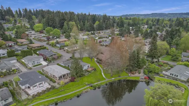 Drone view of Reflection Lake and the Clubhouse, home is across from the Clubhouse.