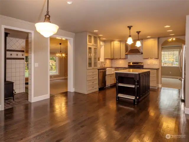 Looking into the kitchen from the Keeping Room and view of the wood stove