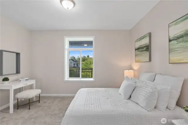 Primary Bedroom – Your Cozy Escape from the Real World (and Alarm Clocks)!