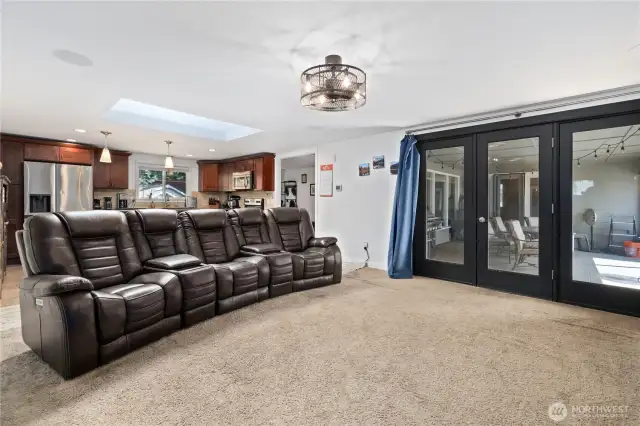 2nd living area with access to covered patio and the open kitchen