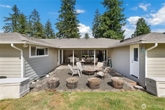 Covered back yard patio with primary on one side and 2nd living on the other side
