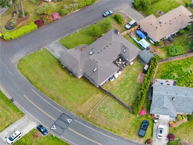Aerial of 1/3 acre with access to fence with an RV parking section