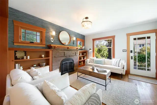 Walking in, you are greeted by beautiful, custom fir wood accents throughout this main level