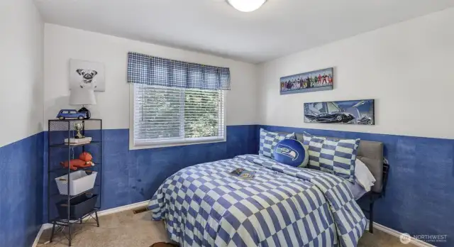 Enjoy this guest bedroom upstairs and just across the primary for easy access suiting your ever need.