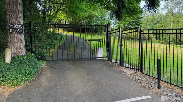 Enjoy the privacy and security of a fully-fenced yard with an electric gate, installed in 2017!