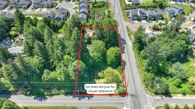Sprawling 1.08 acre corner lot offering privacy and seclusion while still being just minutes to modern amenities.