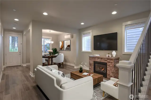 Open living room and dinning room  (Virtually Staged)