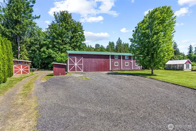 Tons of parking, several outbuildings!