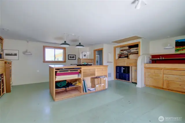 Bonus room currently being used as an artist studio.  Comes with sink and running water.