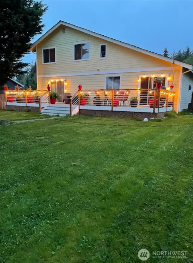 Peaceful fully fenced in back yard.