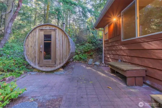 Finnish wood fired sauna just steps outside primary bedroom/en suite
