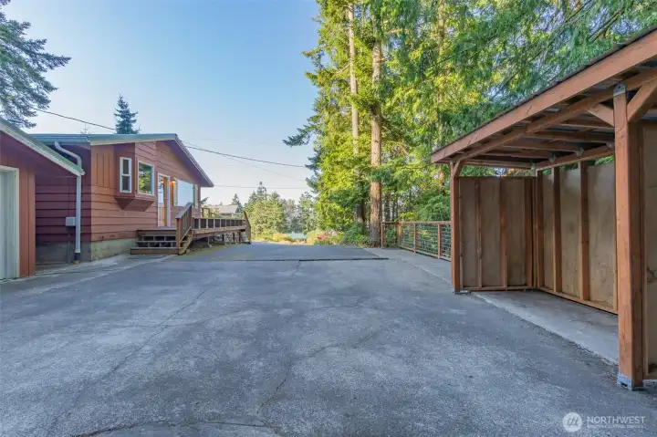 Long drive with plenty of room for parking along with large 2 car garage