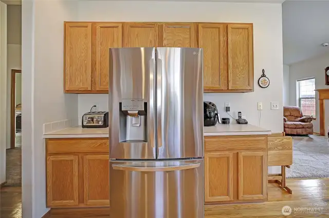 Large kitchen with tons of storage and countertop space.
