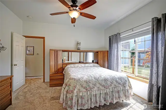 Huge Primary Bedroom with large windows, spacious closets.