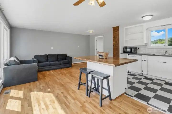 Lots of natural light fill this open space living area.