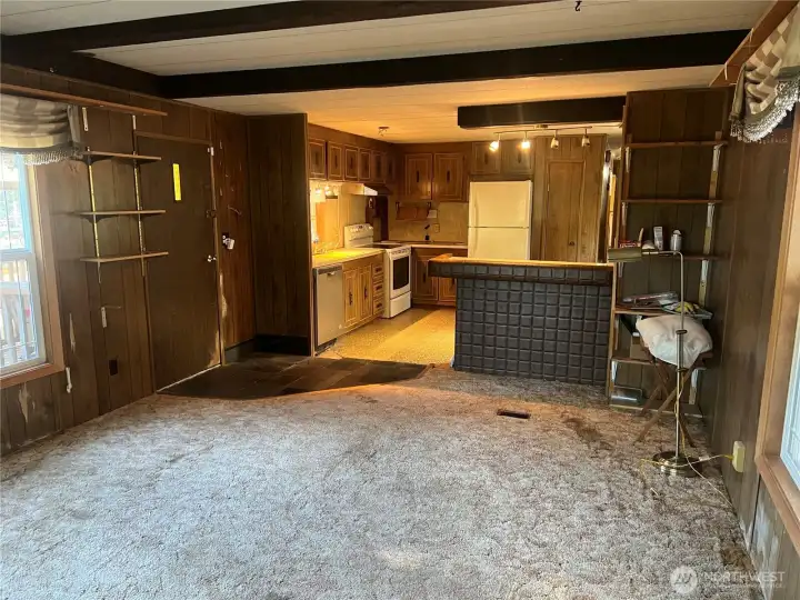 Another view of the living area looking into the kitchen.