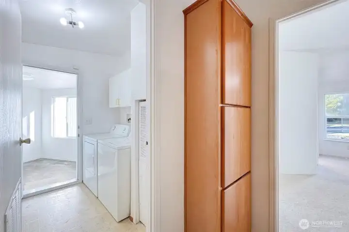 Kitchen to Laundry Room on Left & Primary on Right