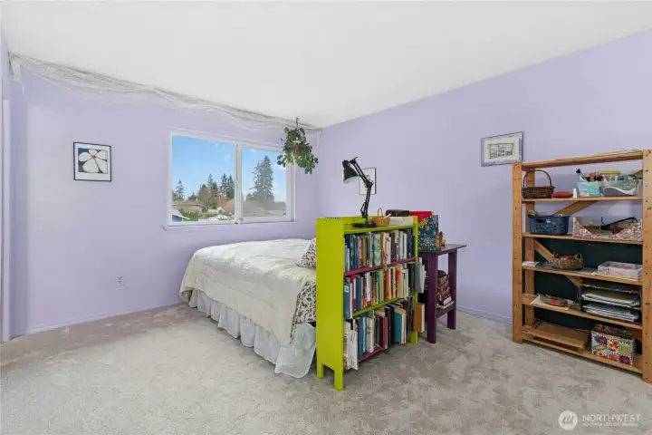 Primary bedroom with morning light