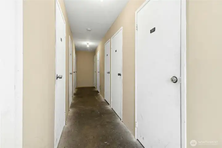 Hallway separating both bedrooms