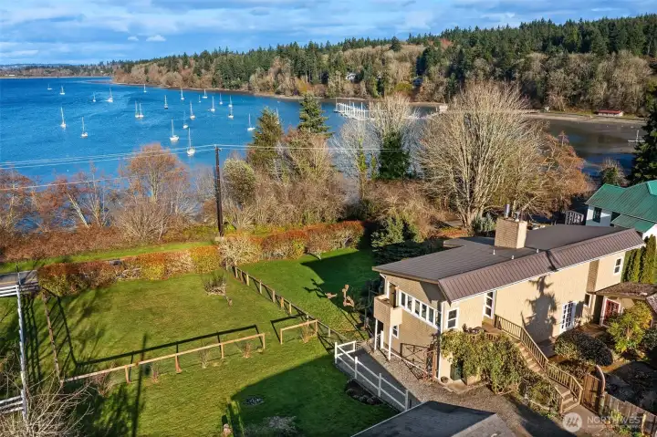 Home sits on almost 1/2 an acre w/ mature fruit trees, full fenced areas, and endless garden opportunities. Plus look at that view!