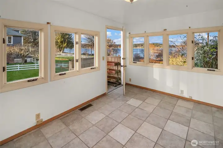 Serene, light-filled upper story room overlooking Docton Harbor on Vashon, ideal for an office or creative space. It even has a "Juliet" Balcony.